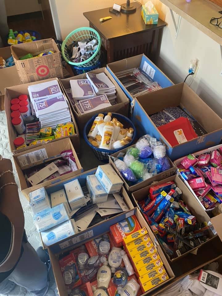 Backpacks and community resources prepared for distribution through Savage Sports Community Development Corp.