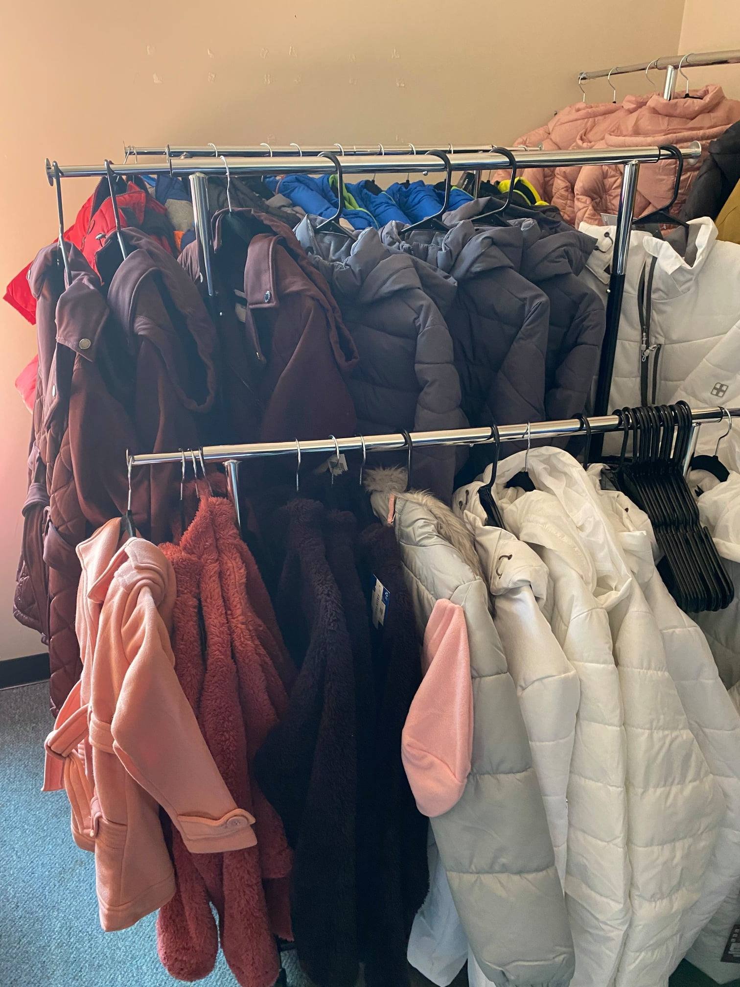 Winter coats prepared for distribution through Savage Sports Community Development Corp.