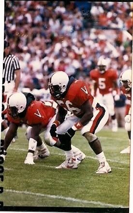 Raymond Savage Jr. playing football for the University of Virginia